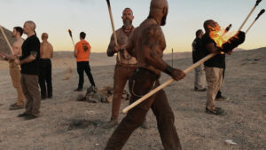 Jack Donovan performing a fire ritual with The Order of Fire in Joshua Tree California