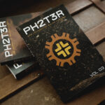 PH2T3R books - all three volumes photographed on an antique trunk