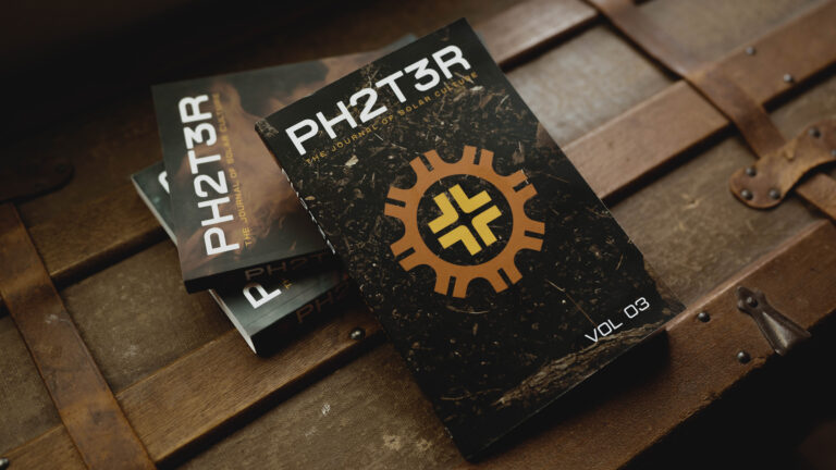 PH2T3R books - all three volumes photographed on an antique trunk